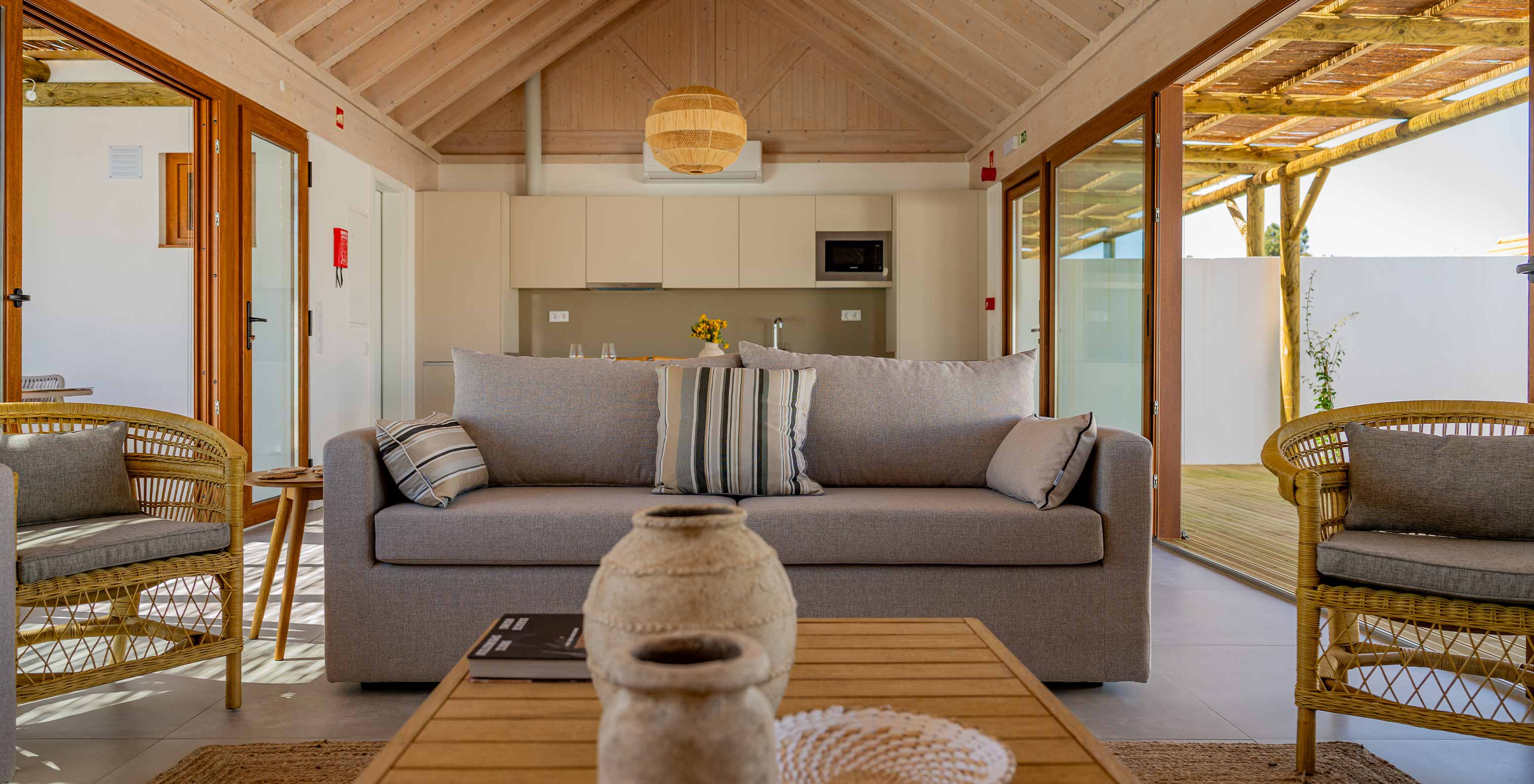 The Premium Villa at Pestana Comporta Village Residences has a bright living room with a sofa and decor