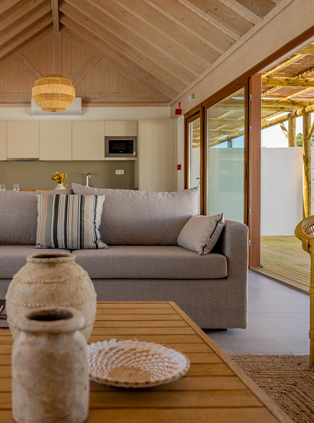 The Premium Villa at Pestana Comporta Village Residences has a bright living room with a sofa and decor