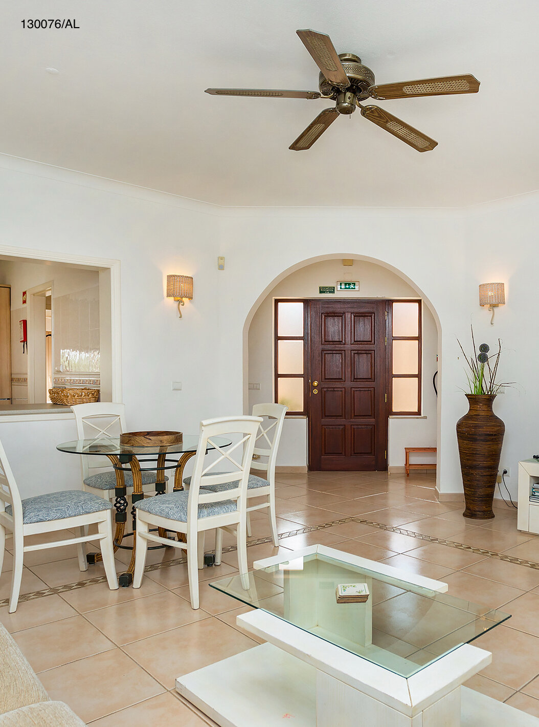 The Pestana Carvoeiro Golf T2 Standard Apartment has a living room with a view to the kitchen