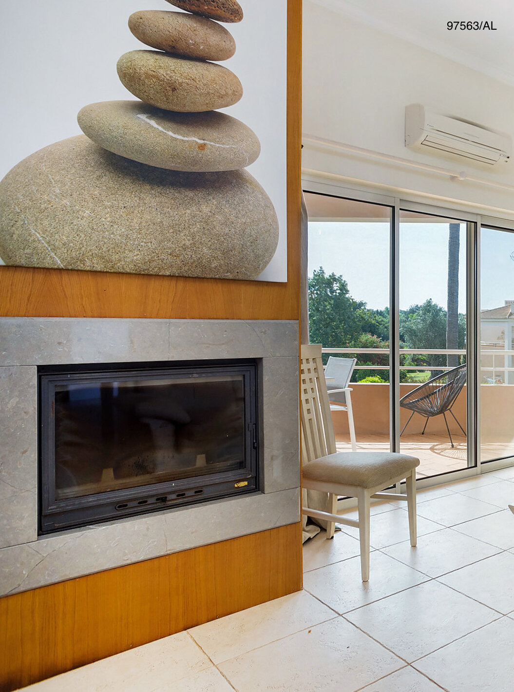 The Pestana Carvoeiro Golf T3 Superior Apartment has a living room with a fireplace, sofas, and a coffee table