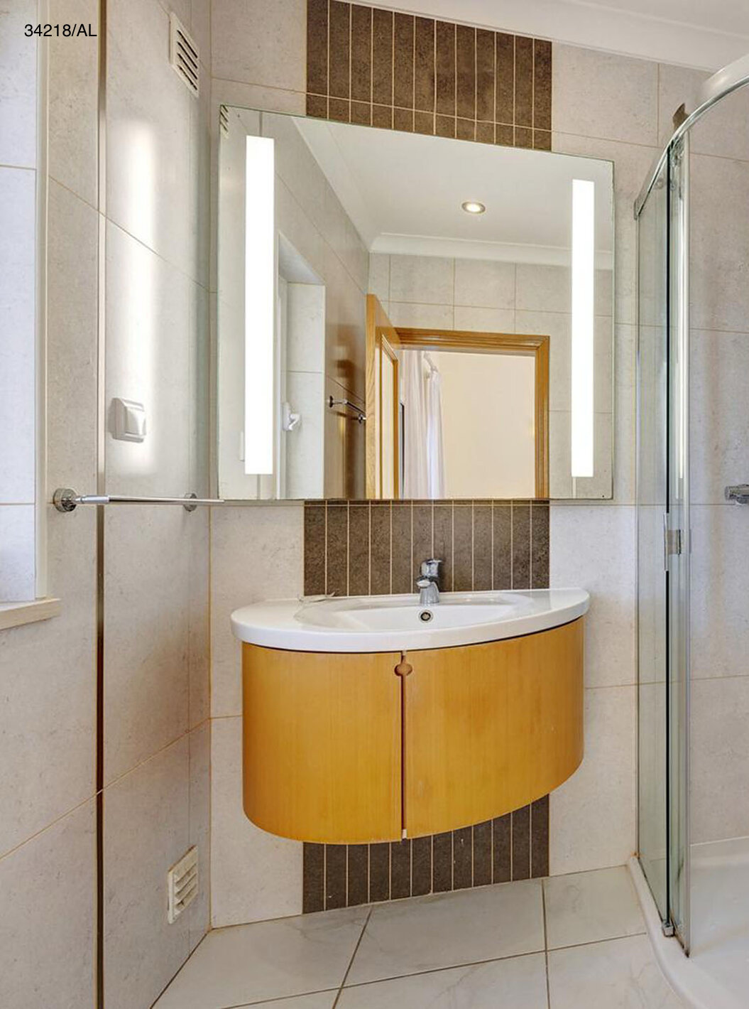 The Pestana Carvoeiro Golf V4 Standard Villa has a bathroom with a sink, mirror, and shower