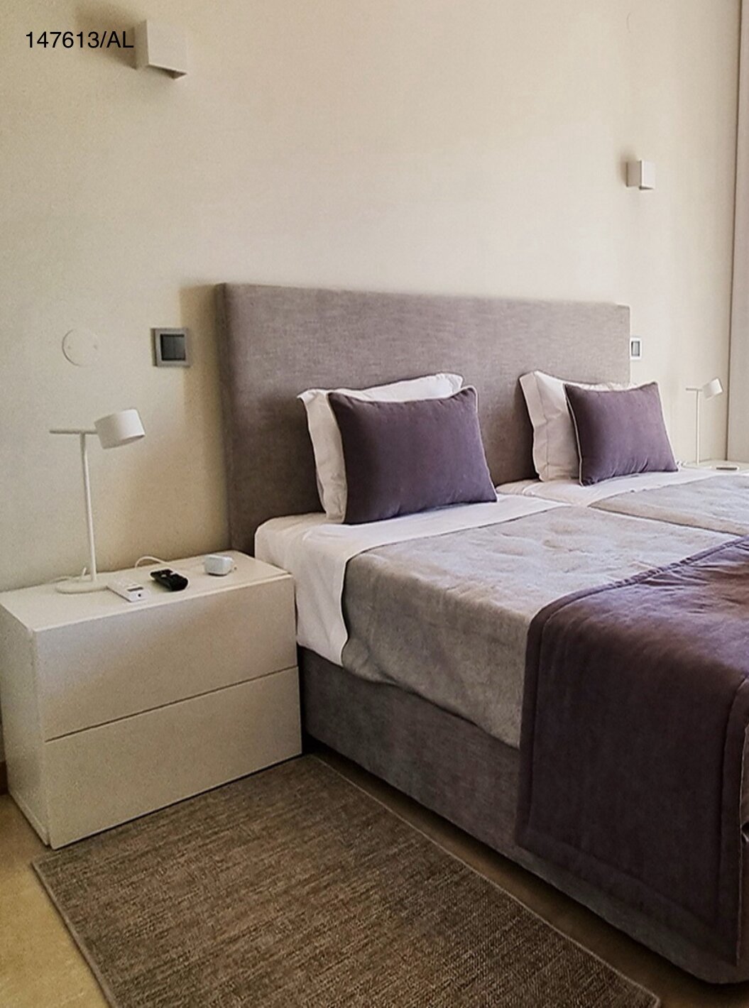 The Pestana Carvoeiro Golf V5 Superior Villa has a bedroom with two single beds and a nightstand