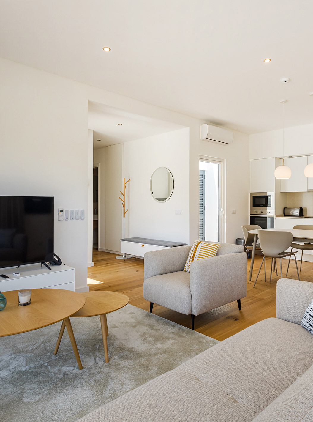 The Premium Villa 3 Bedroom - 4 Adults at Pestana Valley Nature Village has a dining table, a sofa, and a television