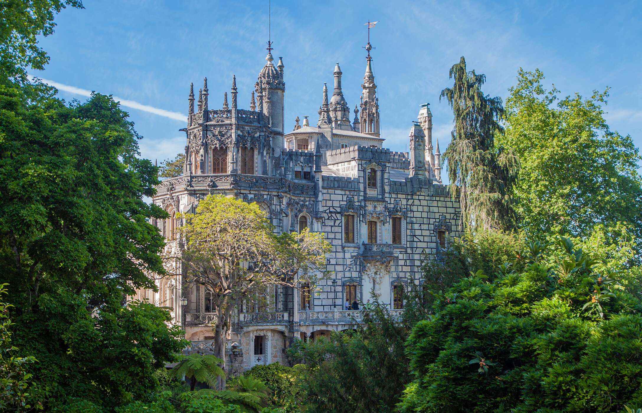 Quinta da Regaleira in Sintra enchants with its mystical gardens, secret caves, and neo-Gothic architecture