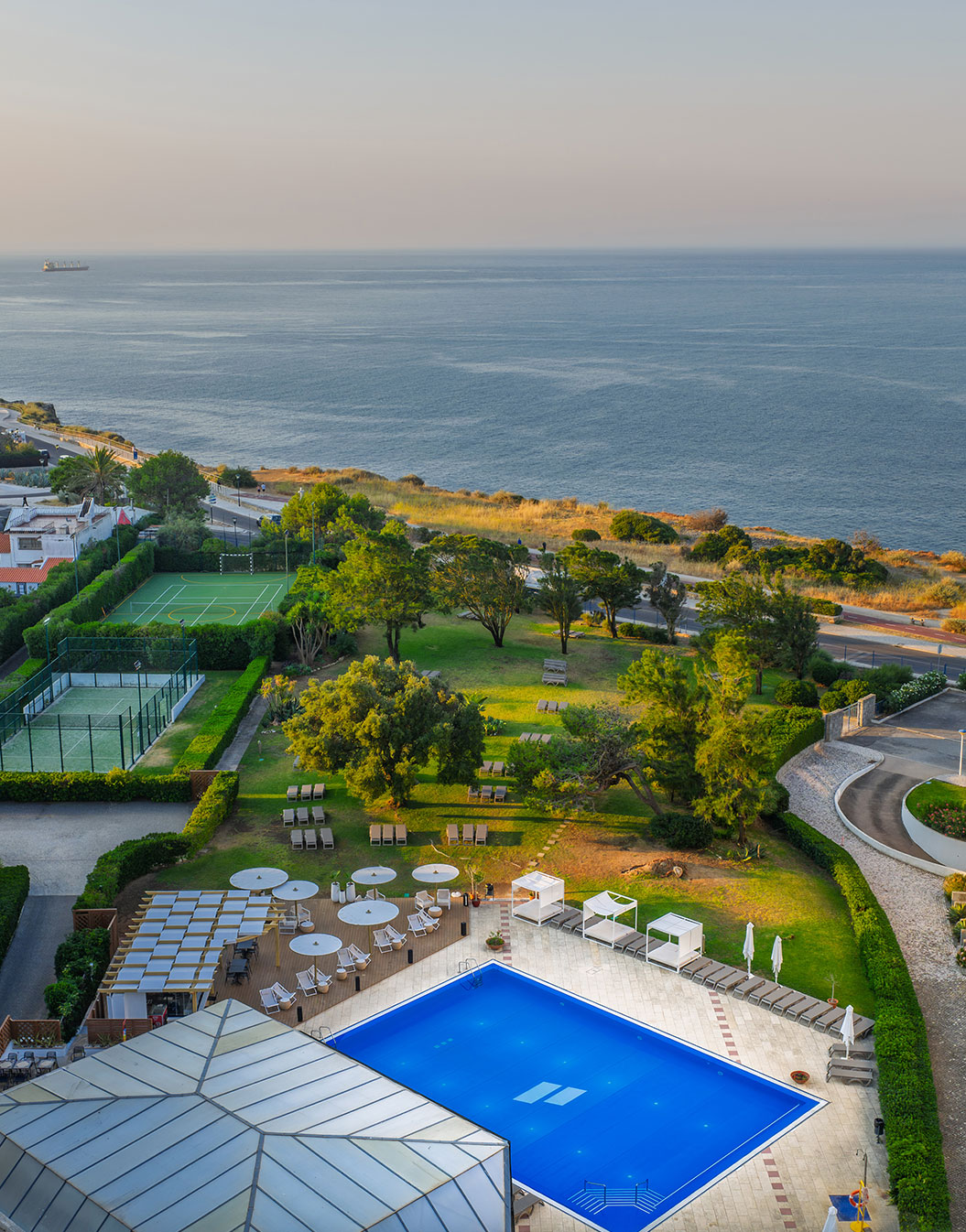 Aerial view of Pestana Cascais, a 4-star hotel in Cascais, with outdoor pool and sea view