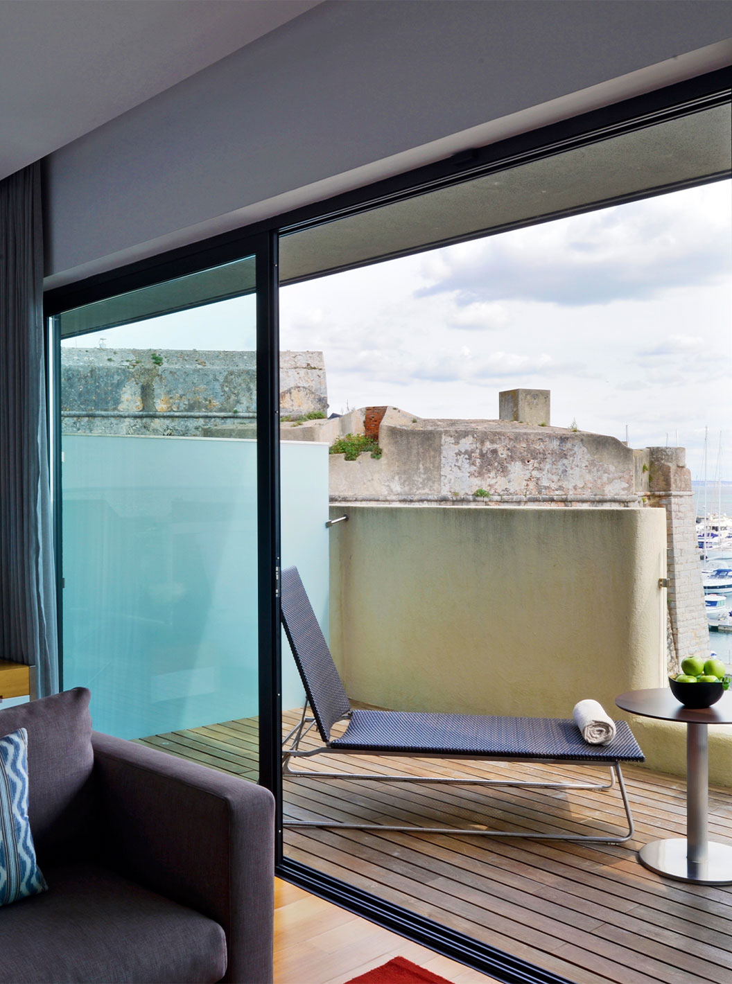 The Superior Double Room at Pestana Cidadela Cascais has a balcony with a deck and a sun lounger, with a sea view