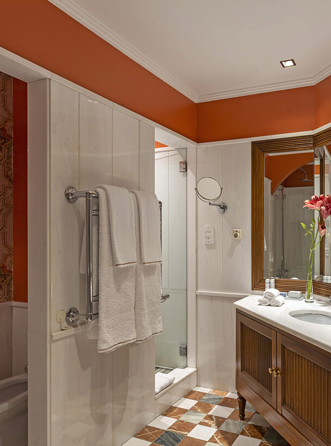 The Suite at Pestana Palace Lisboa has a bathroom with a shower, bathtub, toilet, bidet, and a large sink with a mirror
