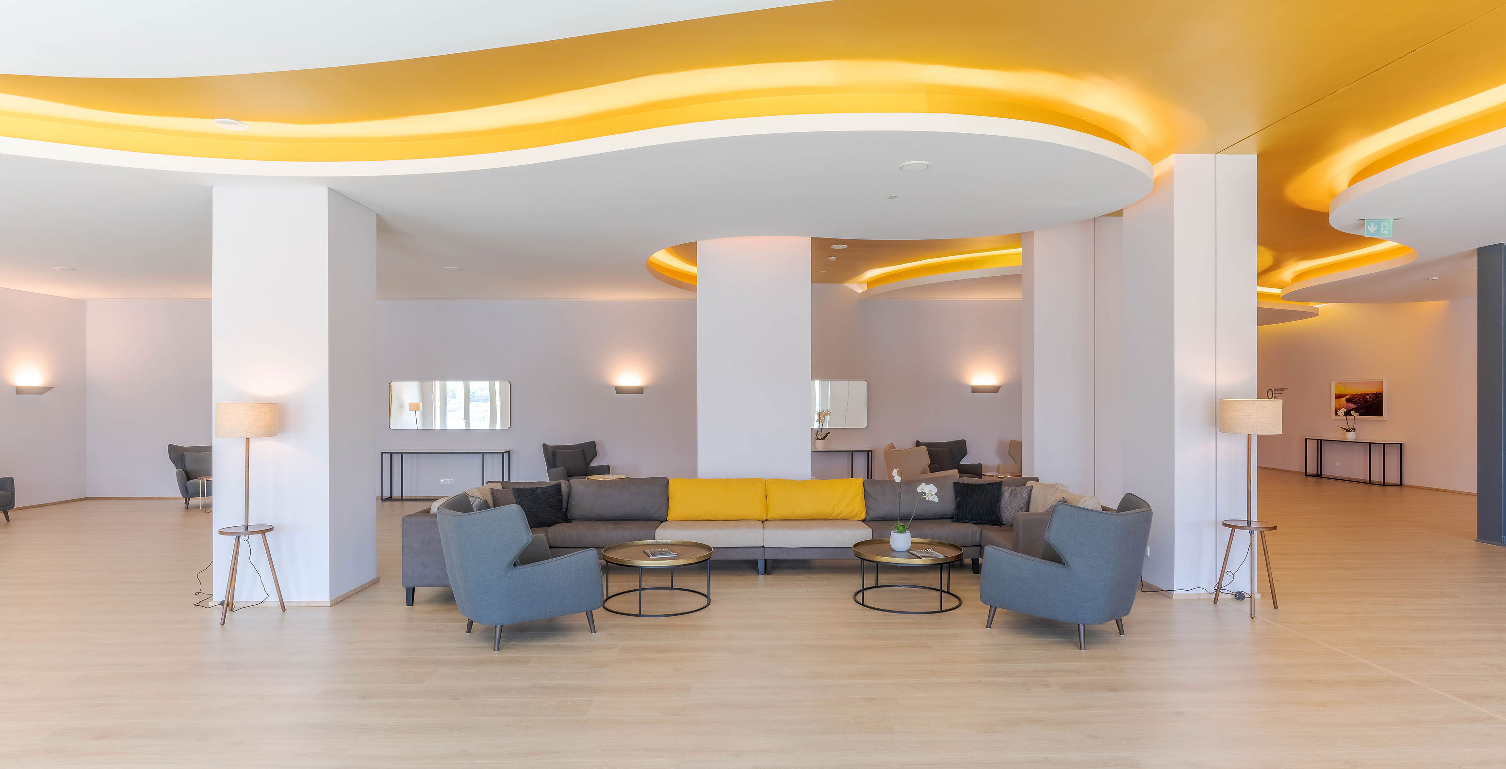 Foyer with modern décor tables and sofas at Pestana Douro Riverside Hotel with Pool by the Douro River