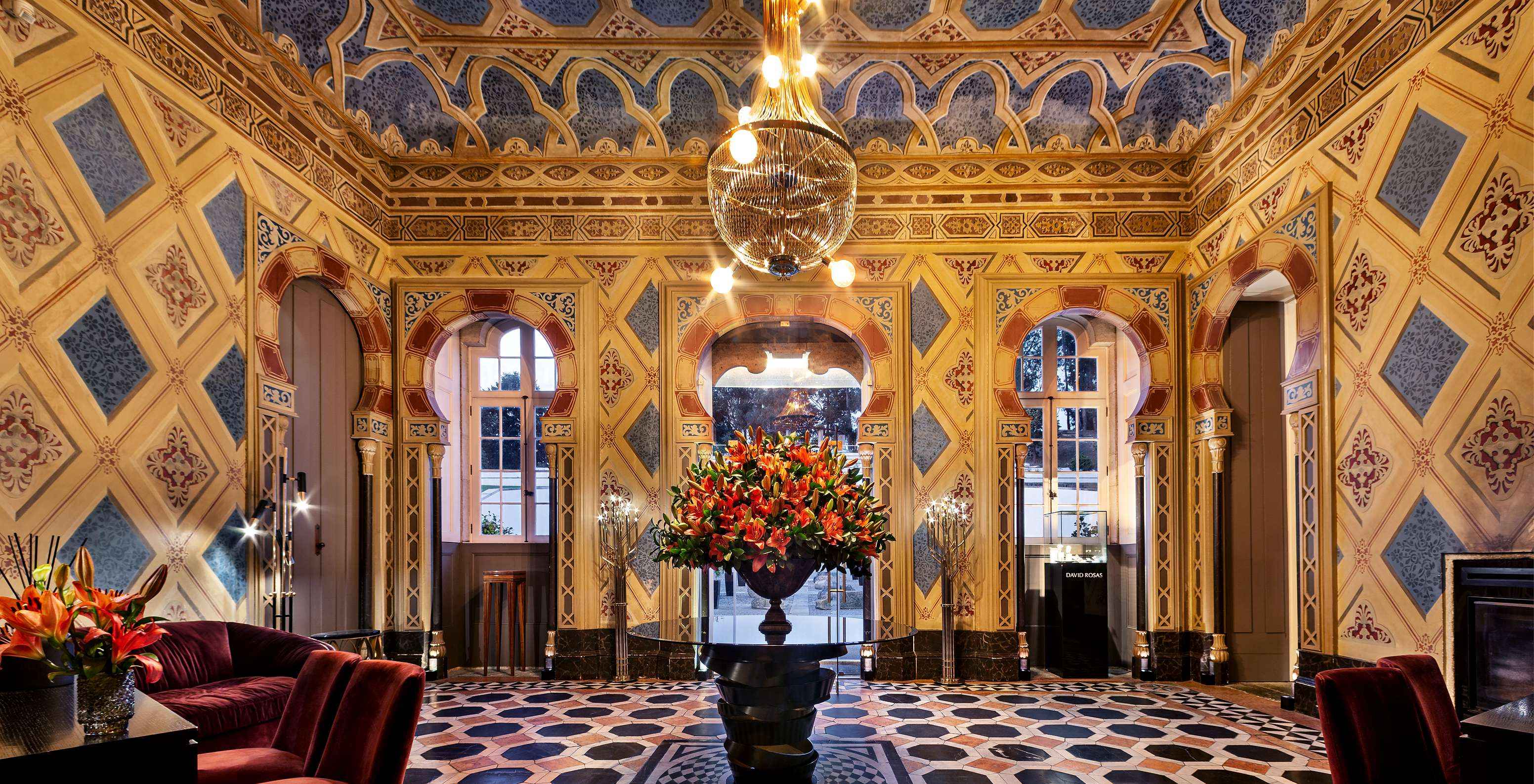 Cozy and luxuriously decorated reception of Pestana Palácio do Freixo, a hotel on the Douro River with spa and pool