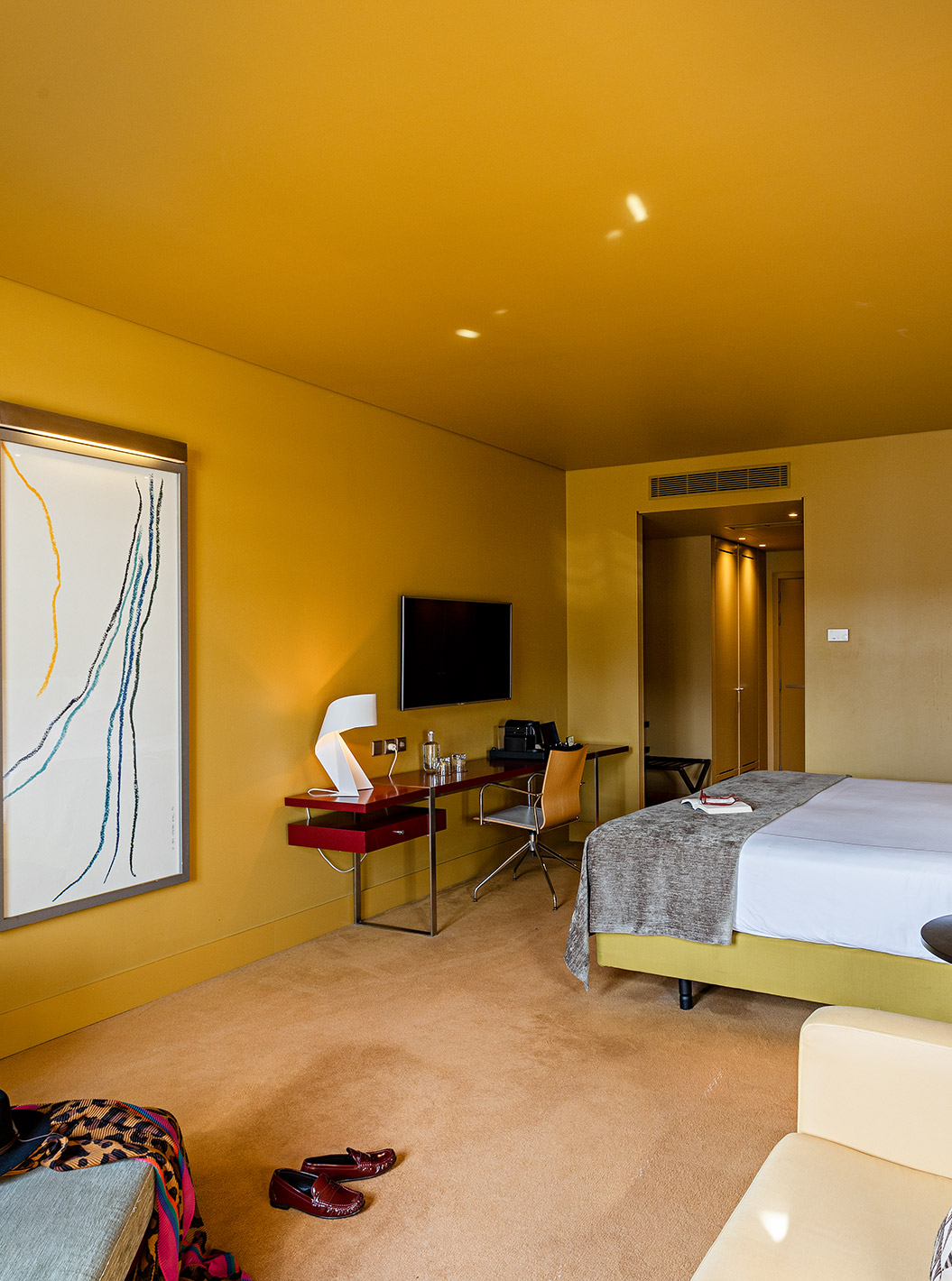 Pestana Palácio do Freixo’s Superior room has a double bed, a sofa bed, and a desk