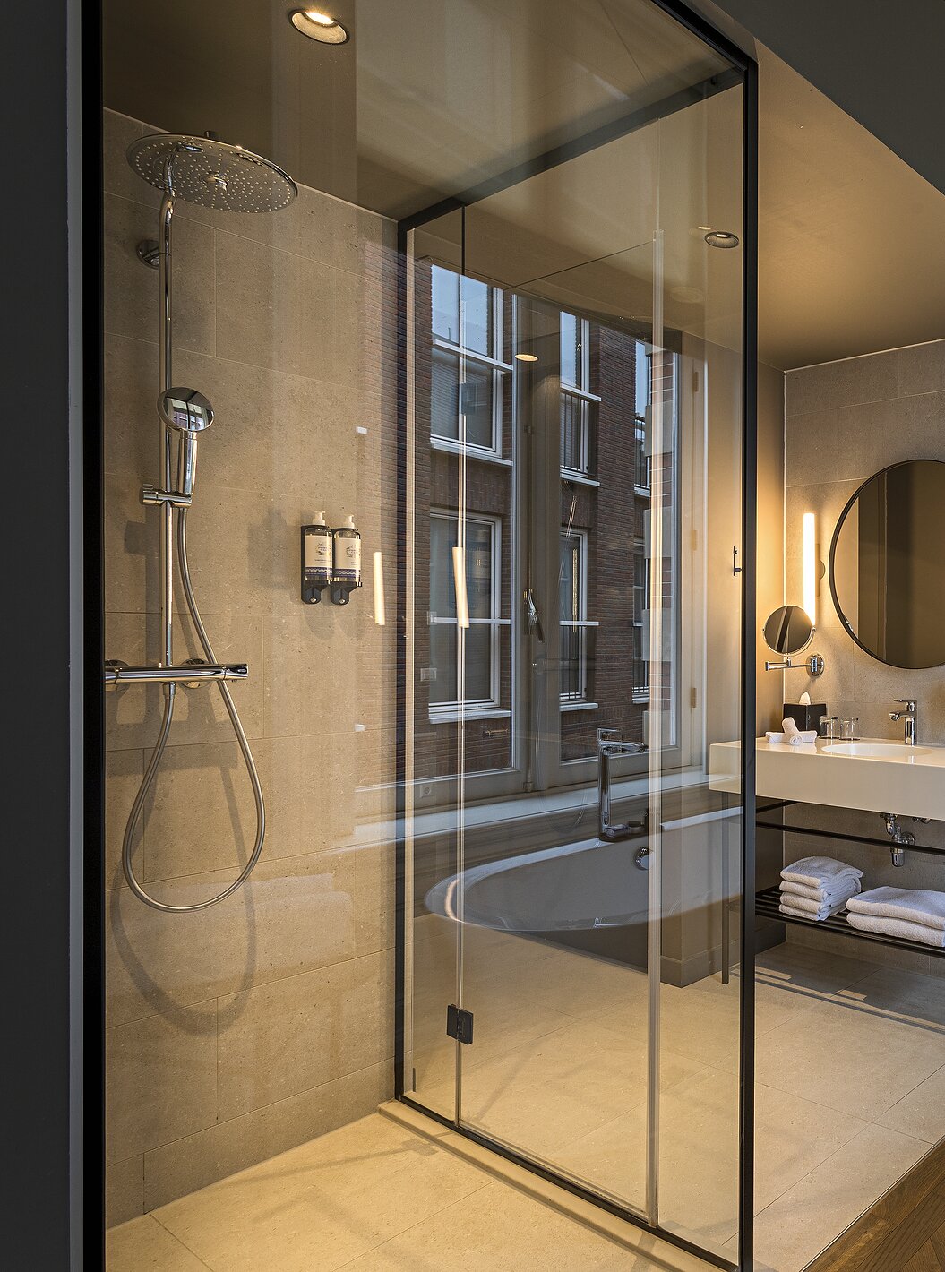 Presidential Suite - River View at Pestana Amsterdam Riverside has a bathroom with mirror, sink, and shower
