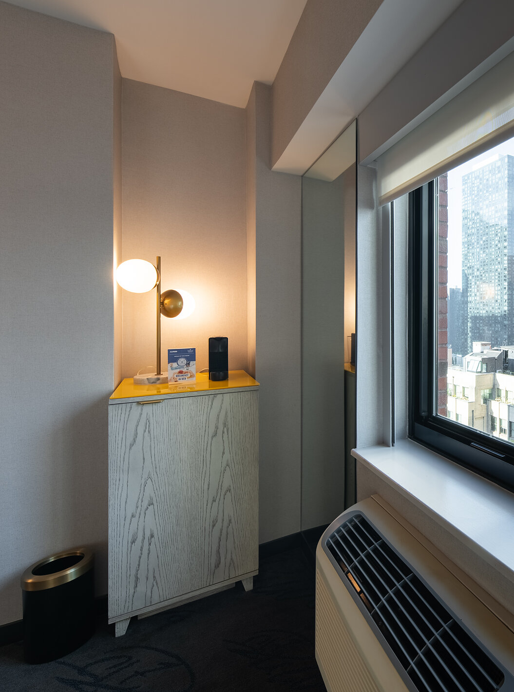 The Deluxe King Room ADA at Pestana CR7 Times Square has a city view window and air conditioning