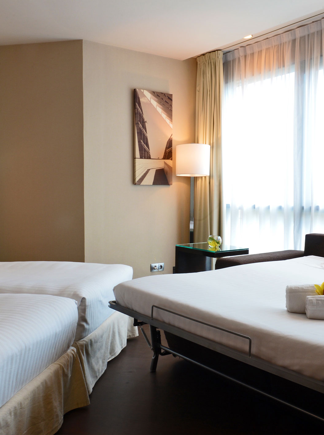 El Superior Familiar del Pestana Arena Barcelona tiene posibilidad de tener tres camas, siendo la tercera un sofá-cama