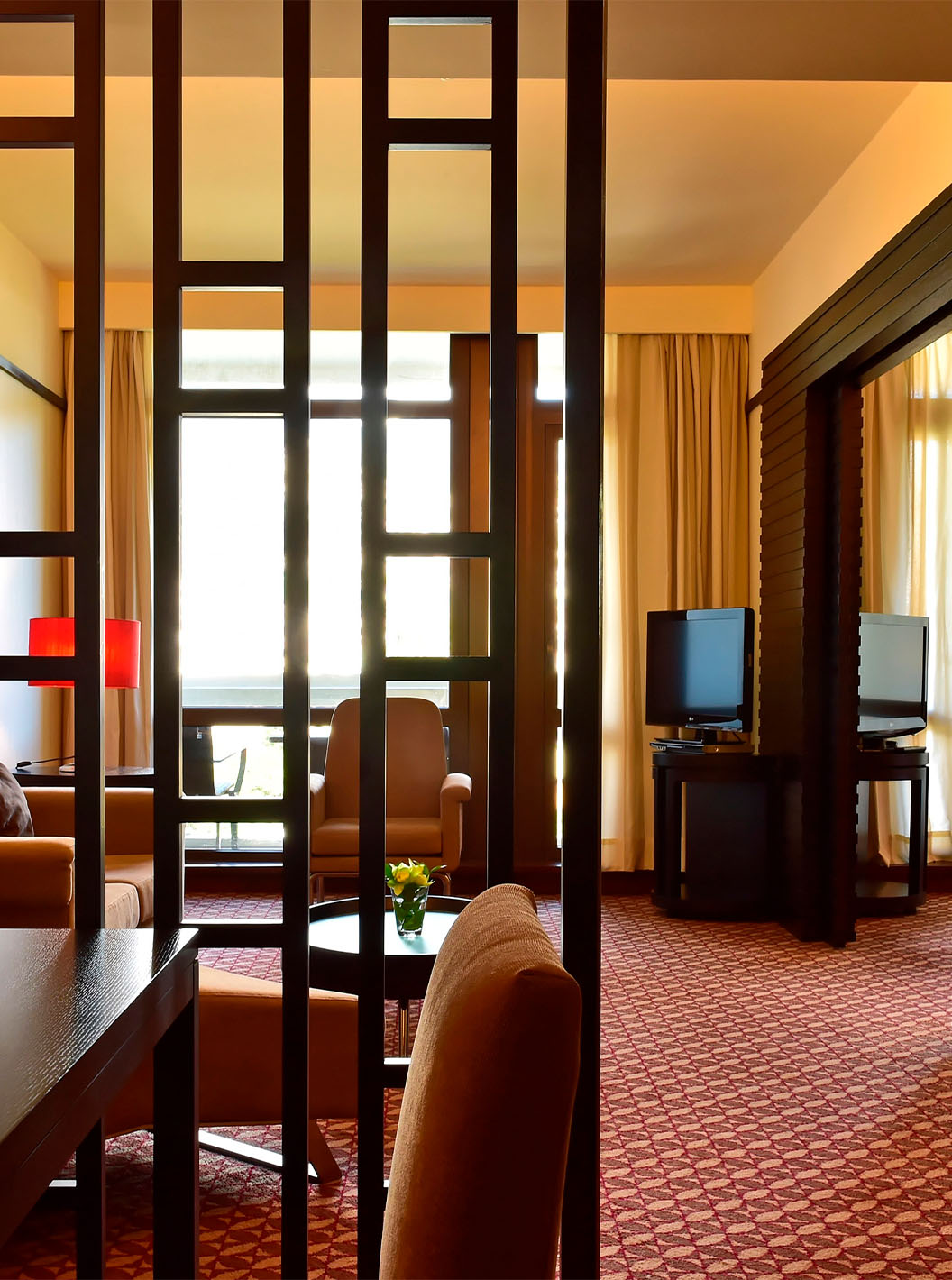 De Suite met Zijzeezicht van Pestana Casino Park heeft een zithoek met bank, chaise longue en salontafel