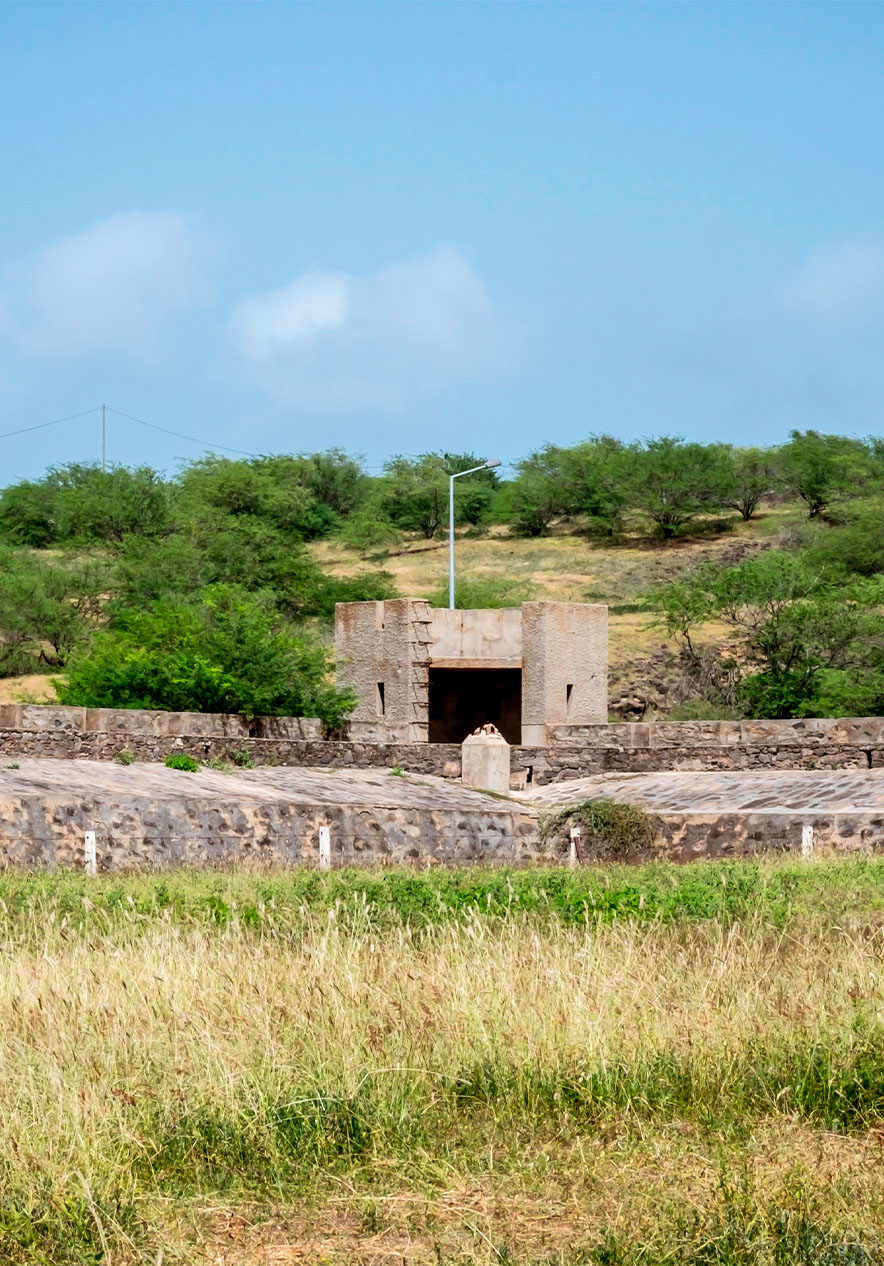 View of the Tarrafal Concentration Camp, with its stone walls and surrounding vegetation