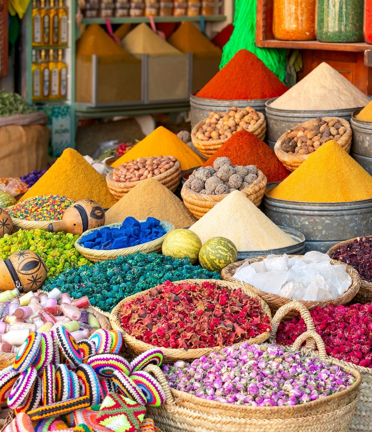 Spice market with the most diverse colors in raffia baskets and various souvenirs