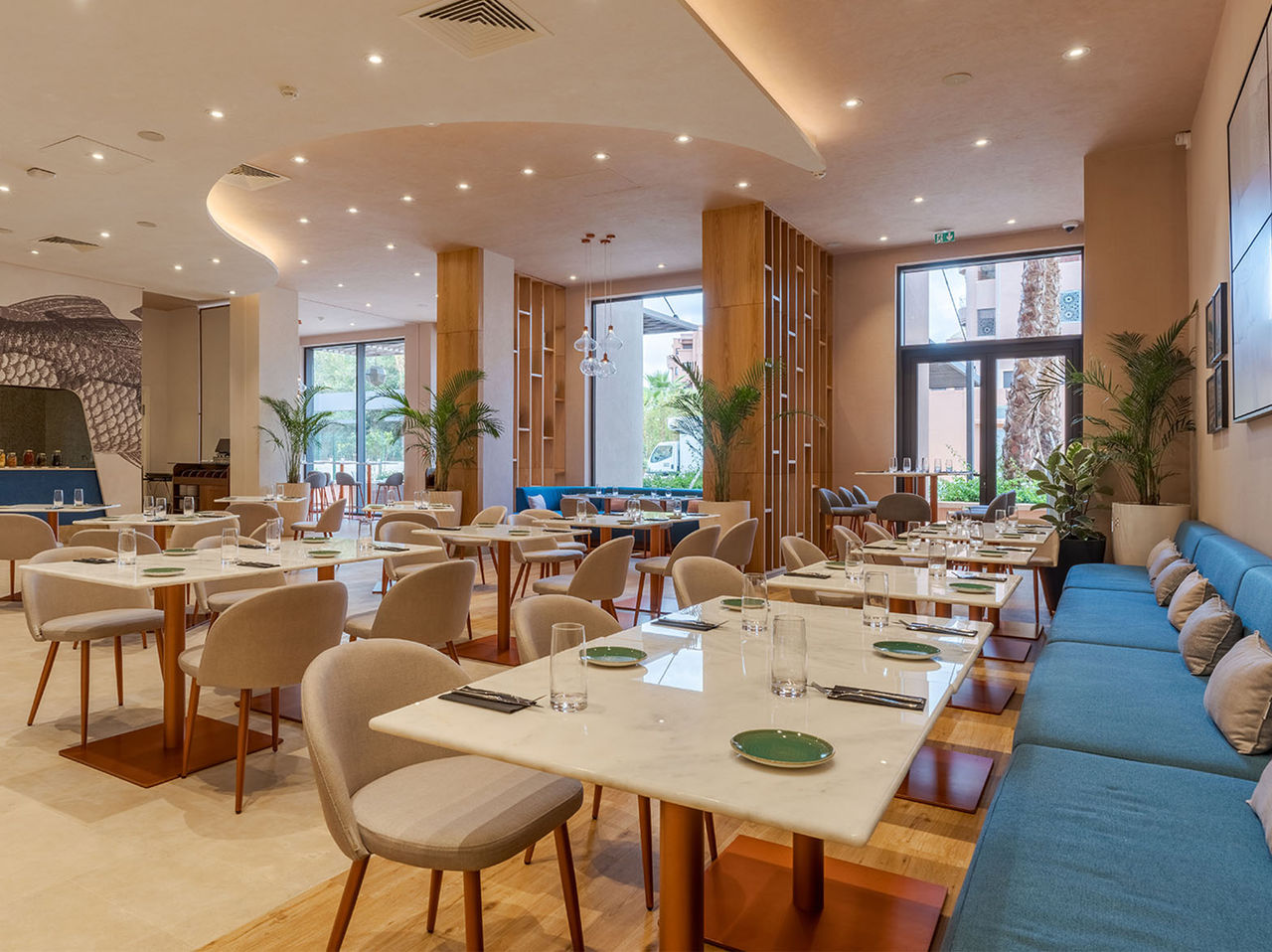 Brasserie restaurant, in a Hotel in Marrakech, has modern decor and natural light