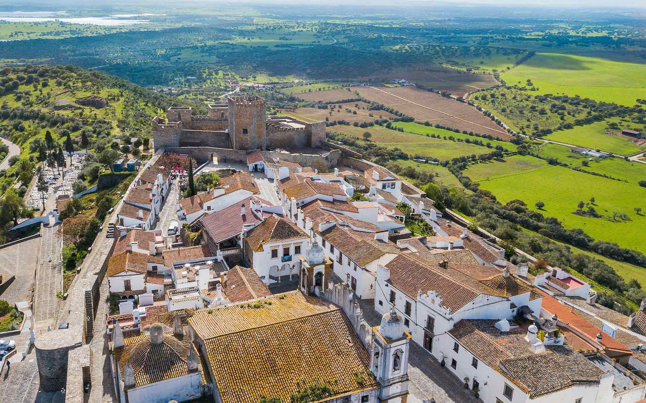 Aerial view of the historic village of Monsaraz, in the Alentejo, highlighting the castle at the top of the hill