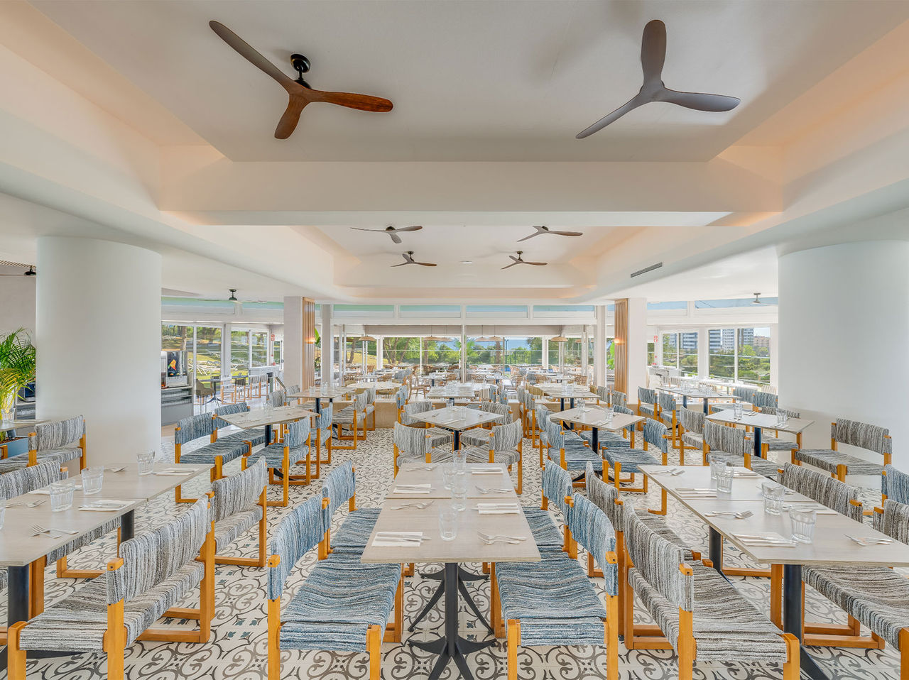 Acqua restaurant is filled with natural light and features ample seating for a relaxed meal