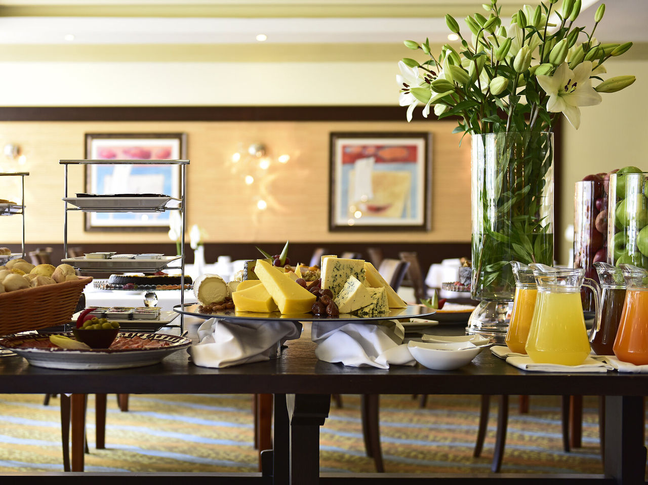 The Valhalla restaurant, at the 4-Star Hotel in Porches, offers a variety of foods, including sausages, bread, eggs, and juices