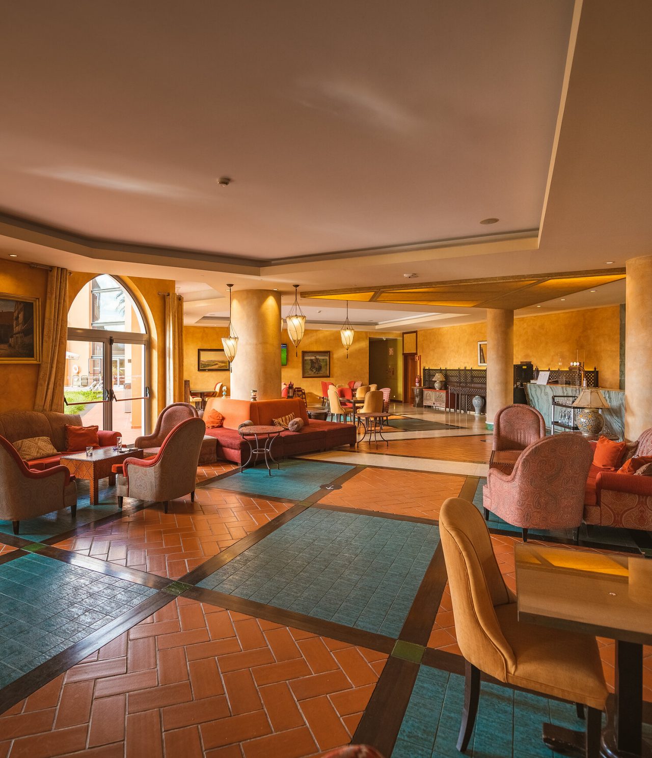 The Chafariz Bar, at the 4-Star Hotel in Sintra, has tables, chairs, and comfortable sofas for enjoying cocktails