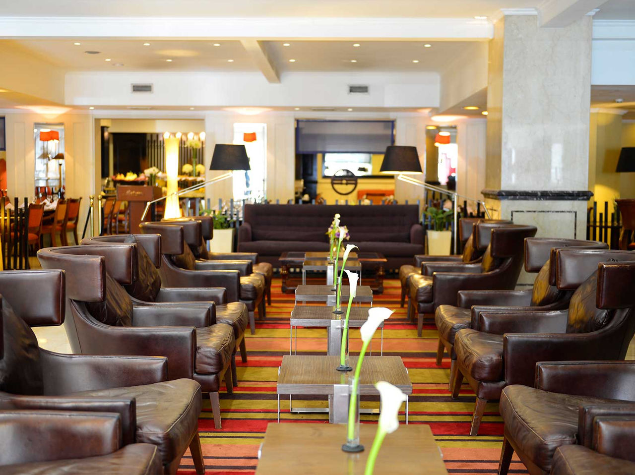 Tango Bar in Buenos Aires has a cozy setting with chairs for cocktails